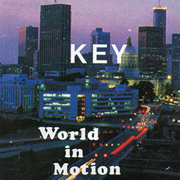 Key - World In Motion